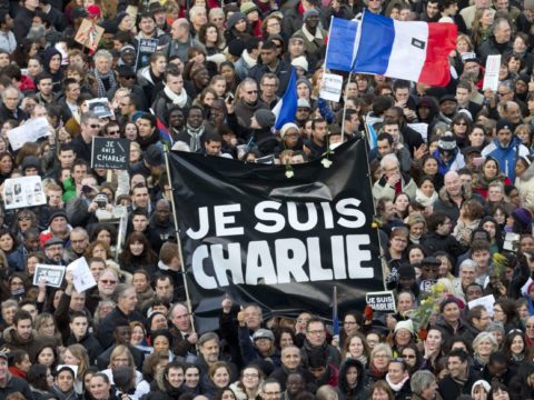 Thousands of people gather at Republique square in Paris, France, Sunday, Jan. 11, 2015.  Thousands of people began filling Frances iconic Republique plaza, and world leaders converged on Paris in a rally of defiance and sorrow on Sunday to honor the 17 victims of three days of bloodshed that left France on alert for more violence. (AP Photo/Peter Dejong)/PAR250/374345240168/1501111622